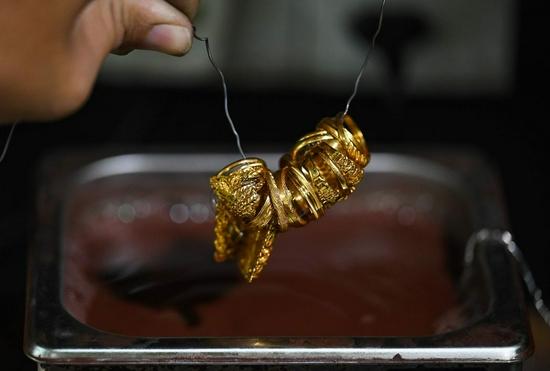 黄金期货周二收高0.2% 4日以来首次上涨